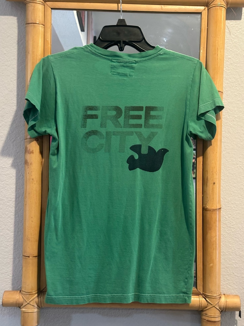 Freecity! EUC green tee / graphics on both sides. Pre-loved, no flaws seen